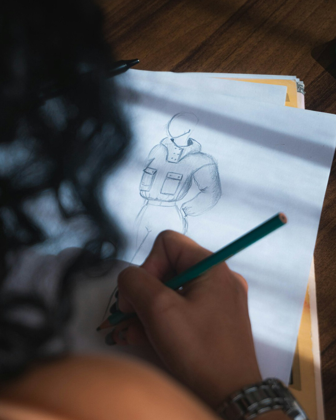 Woman writing a storyboard for a documentary film