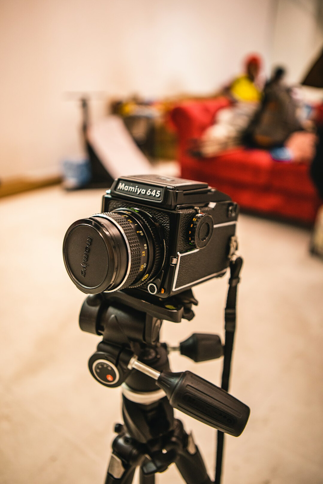 Documentary film camera on a tripod during a shoot